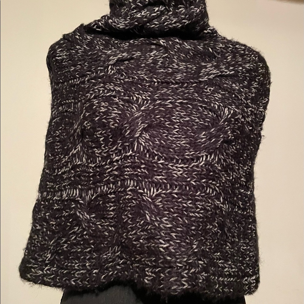 New without tags.Pull on black and gray cape/sweater